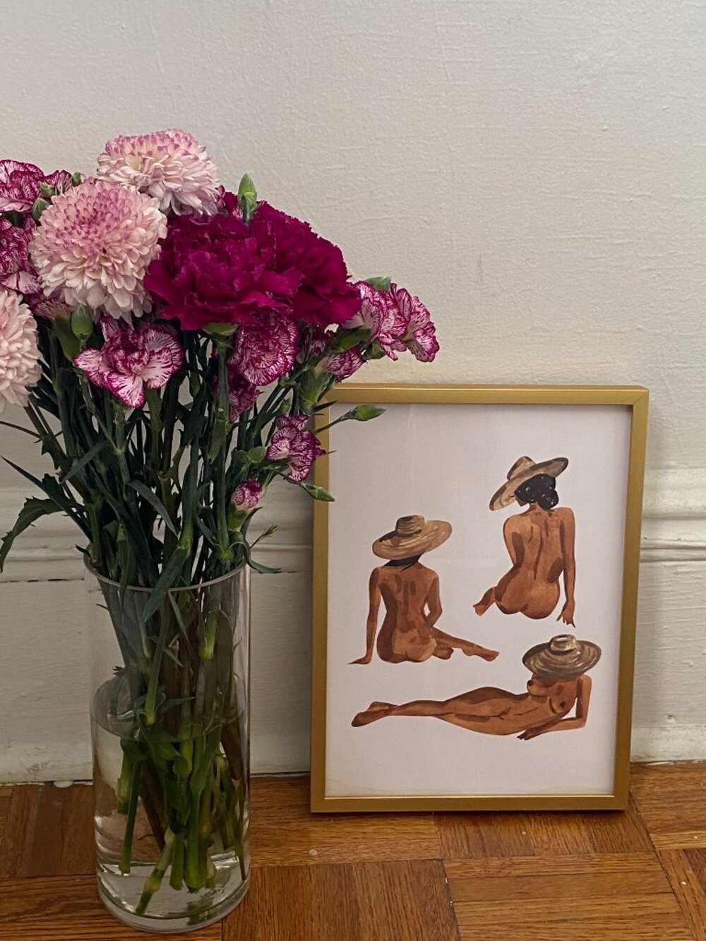 Fashion-Inspired Watercolor Painting of Women Wearing Raffia Hats in Gold Frame